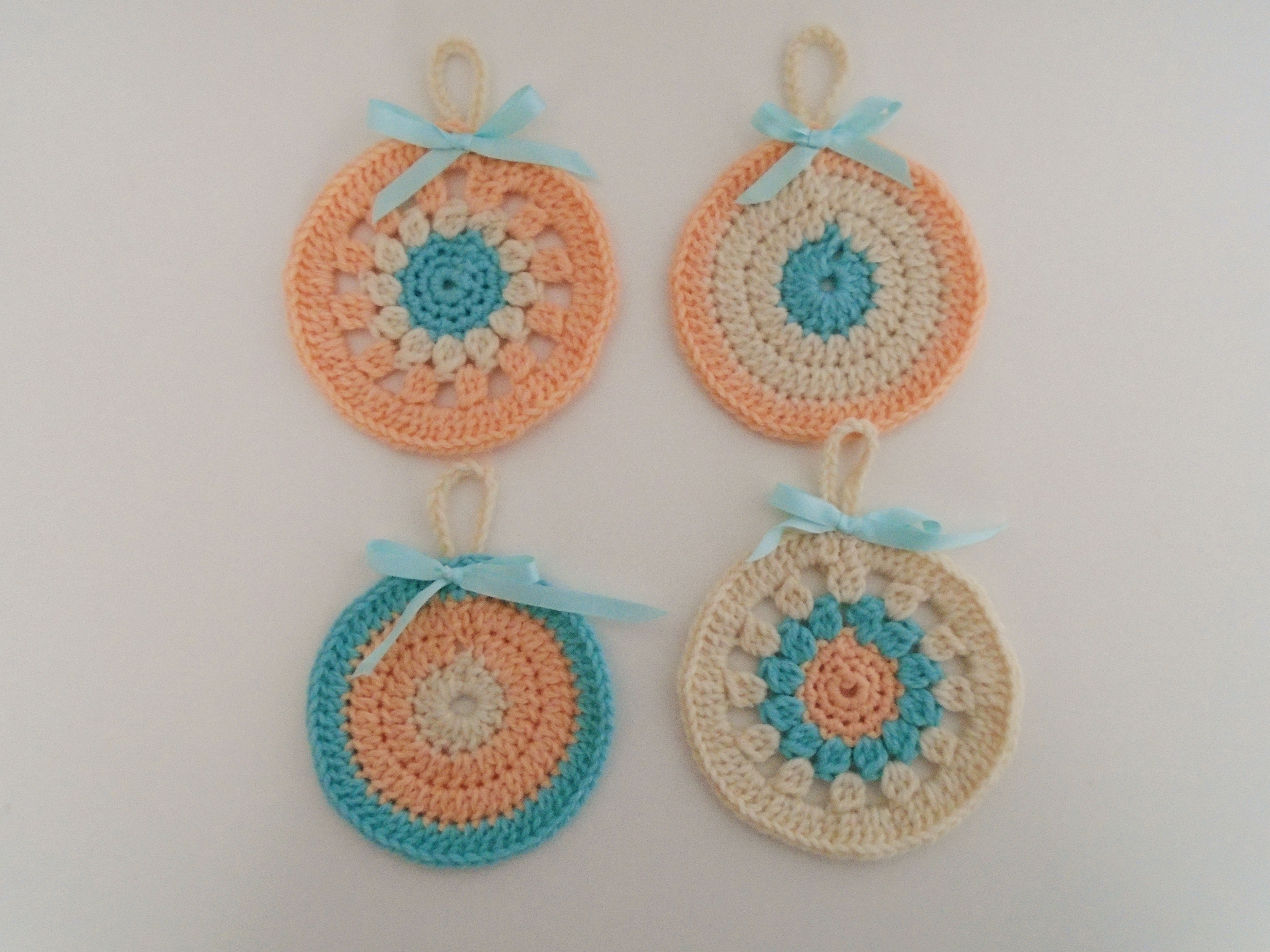 pastel peach cream and mint crocheted christmas baubles